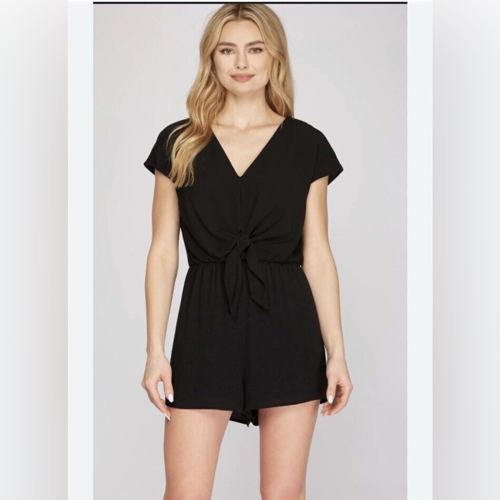 She & Sky Black V-Neck Tie-Front Romper with an open back.